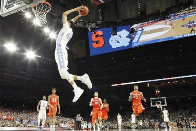 North Carolina forward Justin Jackson (44) dunks the ball on Syracuse during the second half of the NCAA Final Four tournament college basketball semifinal game Saturday, April 2, 2016, in Houston. (AP Photo/David J. Phillip)