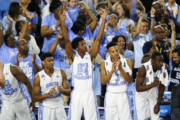 Apr 2, 2016; Houston, TX, USA; North Carolina Tar Heels players react from the bench during the second half against the Syracuse Orange in the 2016 NCAA Men's Division I Championship semi-final game at NRG Stadium. North Carolina won 83-66. Mandatory Credit: Troy Taormina-USA TODAY Sports