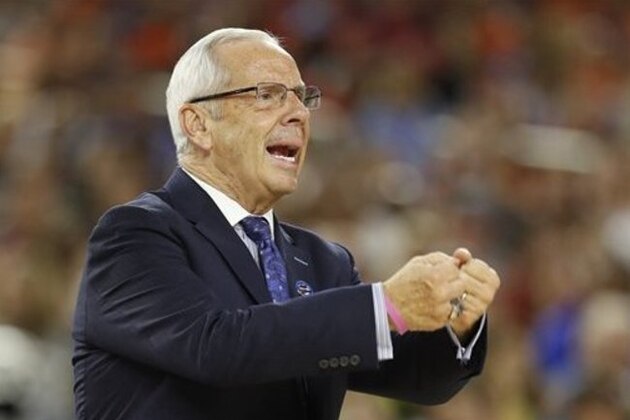 North Carolina head coach Roy Williams speaks during the first half of the NCAA Final Four tournament college basketball semifinal game against Syracuse,  Saturday, April 2, 2016, in Houston. (AP Photo/David J. Phillip)
