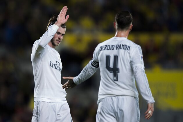 LAS PALMAS, SPAIN - MARCH 13: Gareth Bale (L) of Real Madrid CF clashes hands with his teammate Sergio Ramos (R) during the La Liga match between UD Las Palmas and Real Madrid CF at Estadio de Gran Canaria on March 13, 2016 in Las Palmas, Spain.  (Photo by Gonzalo Arroyo Moreno/Getty Images)