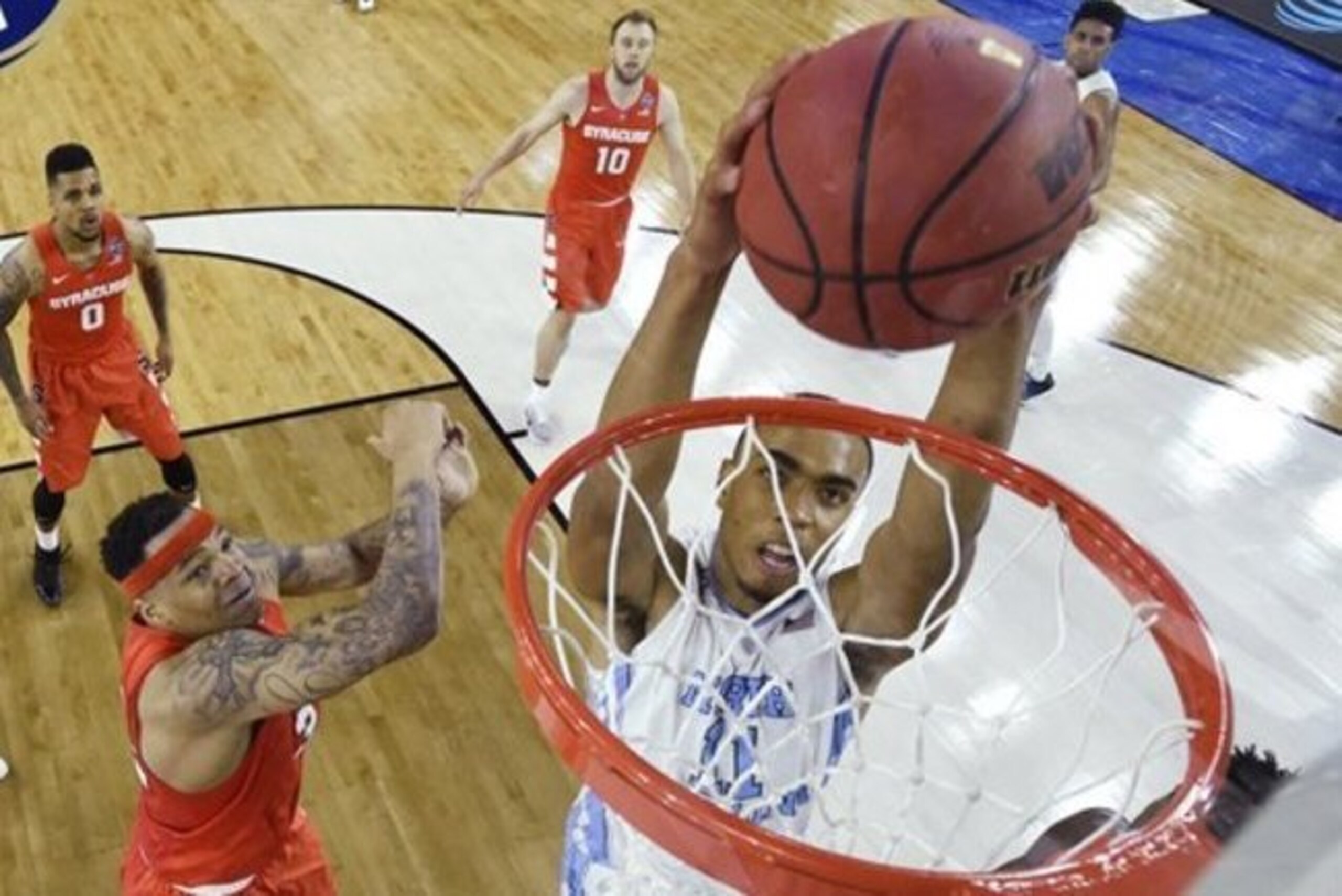 North Carolina forward Brice Johnson (11) dunks the ball against Syracuse during the first half of the NCAA Final Four tournament college basketball semifinal game Saturday, April 2, 2016, in Houston. (Chris Steppig/NCAA Photos via AP, Pool)