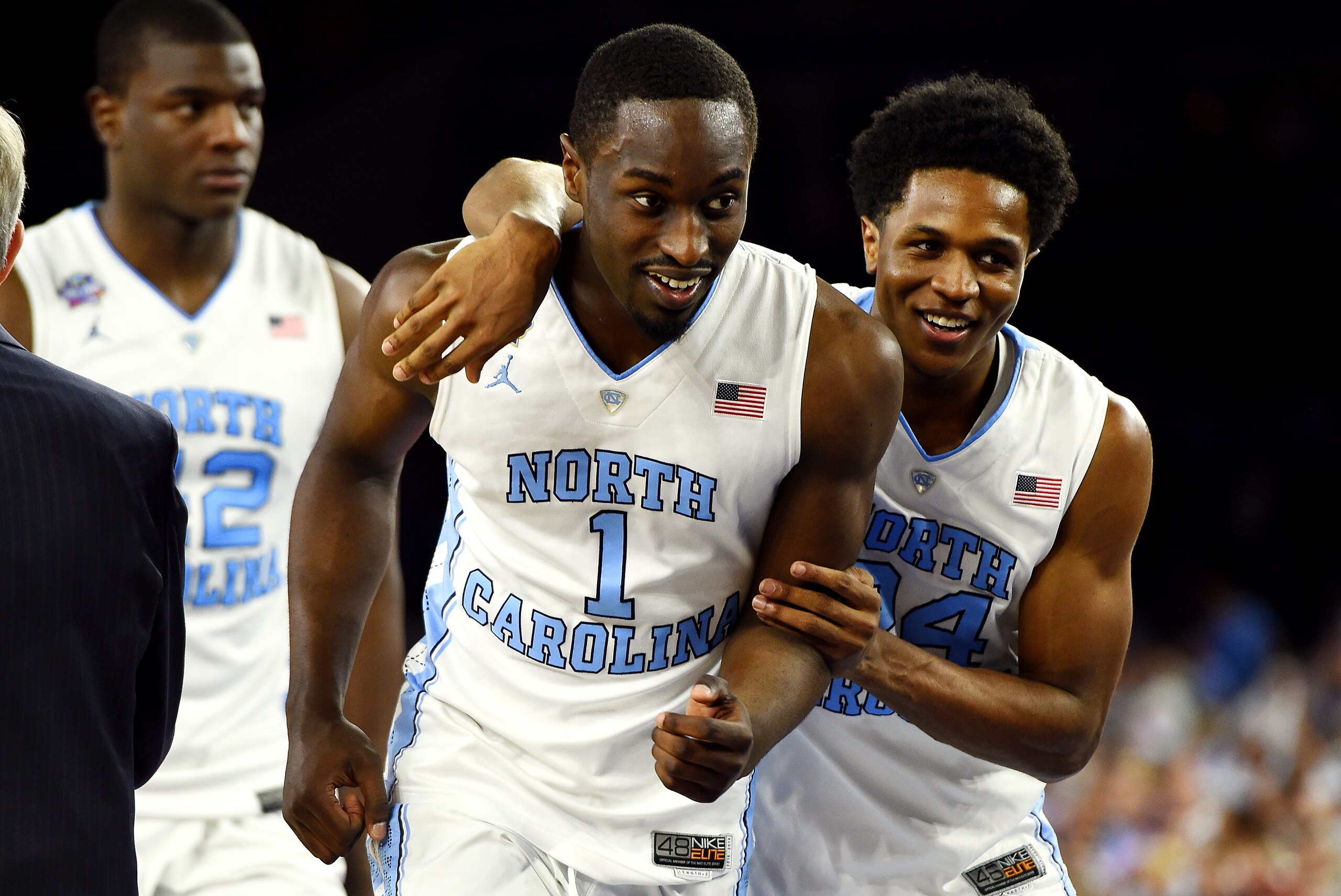 Apr 2, 2016; Houston, TX, USA; North Carolina Tar Heels forward Theo Pinson (1) and North Carolina Tar Heels guard Kenny Williams (24) react after the game against the Syracuse Orange in the 2016 NCAA Men's Division I Championship semi-final game at NRG Stadium. Mandatory Credit: Bob Donnan-USA TODAY Sports Apr 2, 2016; Houston, TX, USA; North Carolina Tar Heels forward Theo Pinson (1) and North Carolina Tar Heels guard Kenny Williams (24) react after the game against the Syracuse Orange in the 2016 NCAA Men's Division I Championship semi-final game at NRG Stadium. Mandatory Credit: Bob Donnan-USA TODAY Sports