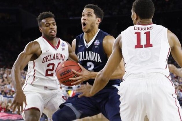 Villanova guard Josh Hart (3) moves between Oklahoma's Cousins (11) and Buddy Hield (24) during the second half of the NCAA Final Four tournament college basketball semifinal game Saturday, April 2, 2016, in Houston. (AP Photo/David J. Phillip)