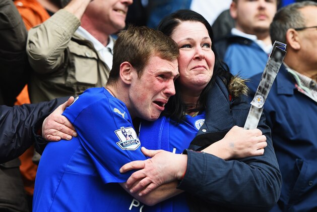LEICESTER, ENGLAND - APRIL 03:  Leicester City fans show their emotions as they celebrate victory after the Barclays Premier League match between Leicester City and Southampton at The King Power Stadium on April 3, 2016 in Leicester, England.  (Photo by Laurence Griffiths/Getty Images)