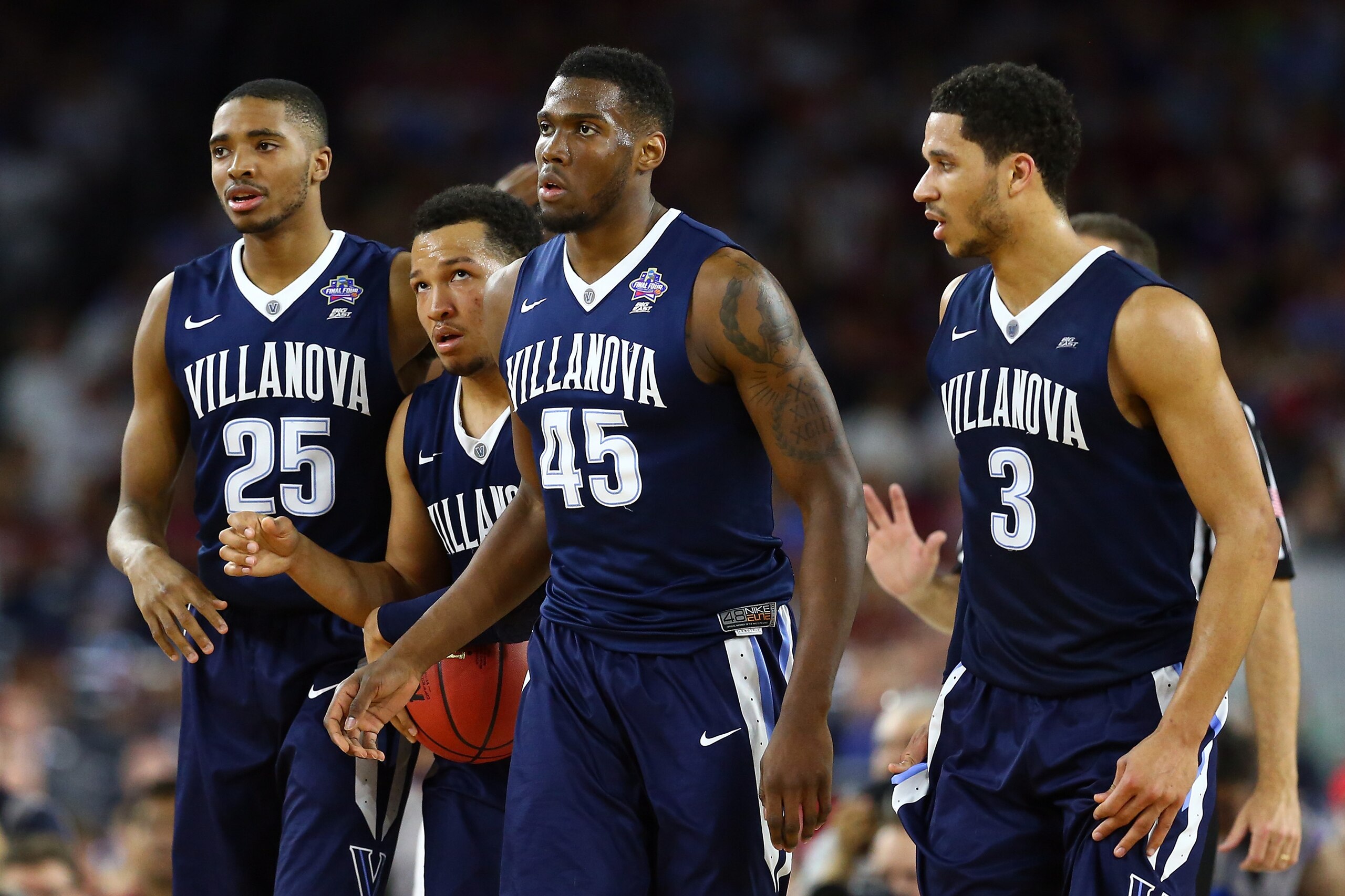 HOUSTON, TEXAS - APRIL 02:  (L-R) Mikal Bridges #25 of the Villanova Wildcats, Jalen Brunson #1, Darryl Reynolds #45, and Josh Hart #3 react in the second half against the Oklahoma Sooners during the NCAA Men's Final Four Semifinal at NRG Stadium on April 2, 2016 in Houston, Texas.  (Photo by Ronald Martinez/Getty Images)