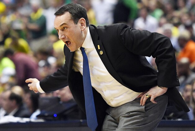 Duke head coach Mike Krzyzewski yells to his team during the first half of an NCAA college basketball game against Oregon in the regional semifinals of the NCAA Tournament, Thursday, March 24, 2016, in Anaheim, Calif. (AP Photo/Mark J. Terrill)