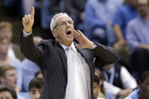 FILE - In this Dec. 1, 2015, file photo, North Carolina coach Roy Williams directs his team during the first half of an NCAA college basketball game against Maryland in Chapel Hill, N.C.  Williams' No. 7 Tar Heels were ranked No. 1 nationally and entered the season as the ACC favorite.  (AP Photo/Gerry Broome, File0