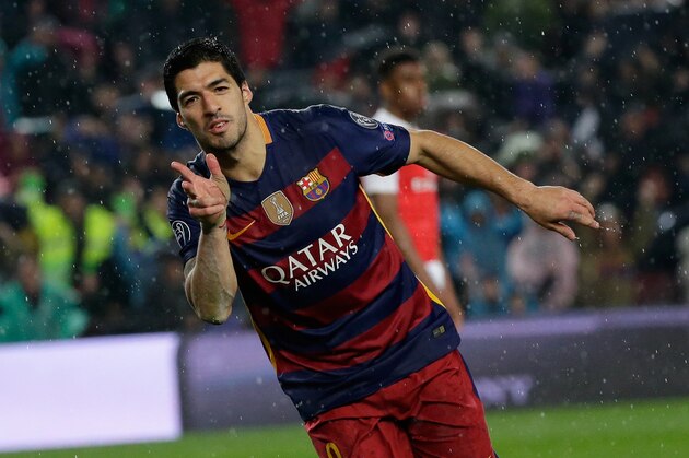 Barcelona's Luis Suarez celebrates after scoring his side’s second goal during the Champions League round of 16 second leg soccer match between FC Barcelona and Arsenal FC at the Camp Nou stadium in Barcelona, Spain, Wednesday, March 16, 2016. (AP Photo/Emilio Morenatti)