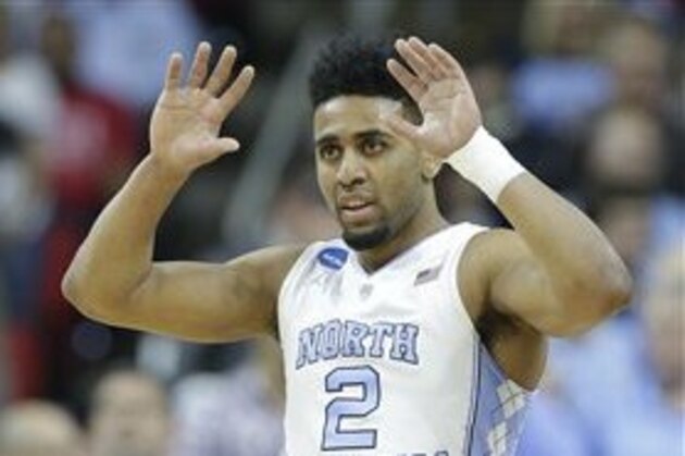 North Carolina guard Joel Berry II (2) reacts to play against Providence during the first half of a second-round men's college basketball game in the NCAA Tournament, Saturday, March 19, 2016, in Raleigh, N.C. (AP Photo/Chuck Burton)