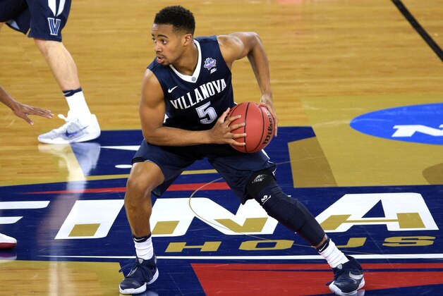 HOUSTON, TX - APRIL 02: Phil Booth #5 of the Villanova Wildcats moves the ball against the Oklahoma Sooners during the 2016 NCAA Men's Final Four Semifinal at NRG Stadium on April 02, 2016 in Houston, Texas. Villanova won 95-51. (Photo by Lance King/Getty Images)