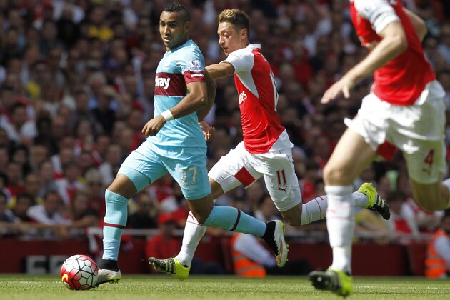 West Ham Uniteds French midfielder Dimitri Payet (L) vies with Arsenals German midfielder Mesut Ozil during the English Premier League football match between Arsenal and West Ham United at the Emirates Stadium in London on August 9, 2015. West Ham won the game 2-0. AFP PHOTO / IKIMAGES
RESTRICTED TO EDITORIAL USE. No use with unauthorised audio, video, data, fixture lists, club/league logos or 'live' services. Online in-match use limited to 45 images, no video emulation. No use in betting, games or single club/league/player publications. / AFP / IKIMAGES / IKIMAGES (Photo credit should read IKIMAGES/AFP/Getty Images) West Ham Uniteds French midfielder Dimitri Payet (L) vies with Arsenals German midfielder Mesut Ozil during the English Premier League football match between Arsenal and West Ham United at the Emirates Stadium in London on August 9, 2015. West Ham won the game 2-0. AFP PHOTO / IKIMAGES
RESTRICTED TO EDITORIAL USE. No use with unauthorised audio, video, data, fixture lists, club/league logos or 'live' services. Online in-match use limited to 45 images, no video emulation. No use in betting, games or single club/league/player publications. / AFP / IKIMAGES / IKIMAGES (Photo credit should read IKIMAGES/AFP/Getty Images)