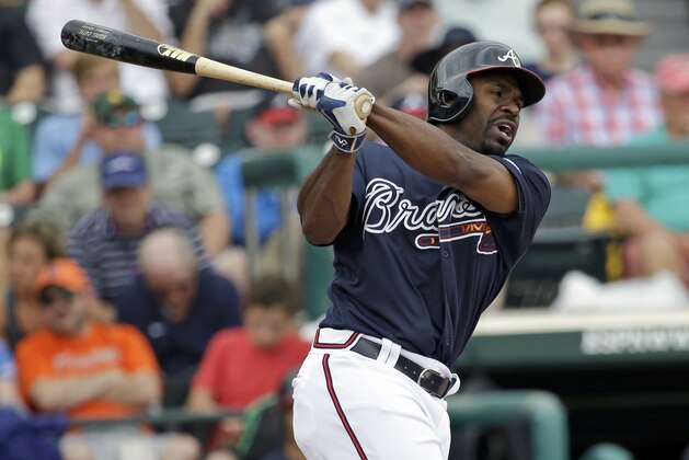 Atlanta Braves' Michael Bourn bats against the Houston Astros in a spring training baseball game, Friday, March 25, 2016, in Kissimmee, Fla. (AP Photo/John Raoux)