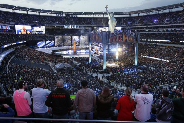 MetLife Stadium is packed with fans as they watch the WWE Wrestlemania 29 event Sunday, April 7, 2013, in East Rutherford, N.J. (AP Photo/Mel Evans)