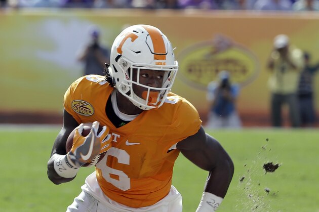 Tennessee running back Alvin Kamara runs with the ball against Northwestern during the second quarter of the Outback Bowl NCAA college football game Friday, Jan. 1, 2016, in Tampa, Fla. (AP Photo/Chris O'Meara)