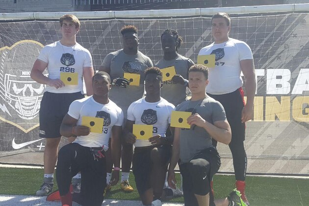 The Opening invites (top left, clockwise): offensive tackle Walker Little, defensive tackle Marvin Wilson, linebacker Dylan Moses, offensive tackle Austin Deculus, cornerback Elijah Molden, running back Toneil Carter and running back J.K. Dobbins.