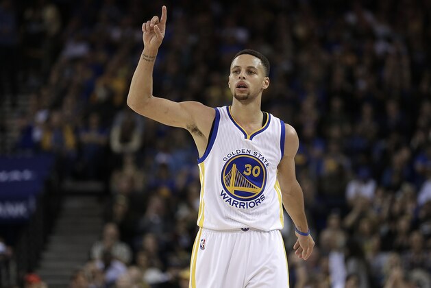 Golden State Warriors' Stephen Curry celebrates a score during the second half of an NBA basketball game against the Portland Trail Blazers Sunday, April 3, 2016, in Oakland, Calif. (AP Photo/Ben Margot)