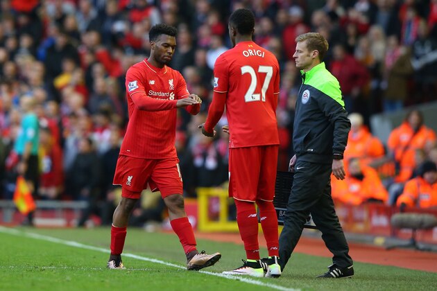 LIVERPOOL, ENGLAND - APRIL 02: Daniel Sturridge (L) of Liverpool is replaced by Divock Origi (C) during the Barclays Premier League match between Liverpool and Tottenham Hotspur at Anfield on April 2, 2016 in Liverpool, England.  (Photo by Alex Livesey/Getty Images)