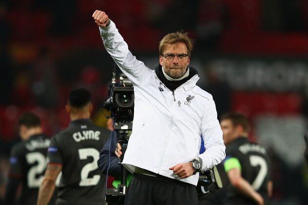 MANCHESTER, ENGLAND - MARCH 17:  Jurgen Klopp, manager of Liverpool celebrates a 3-1 aggregate victory after the UEFA Europa League round of 16 second leg match between Manchester United and Liverpool at Old Trafford on March 17, 2016 in Manchester, England.  (Photo by Clive Brunskill/Getty Images)