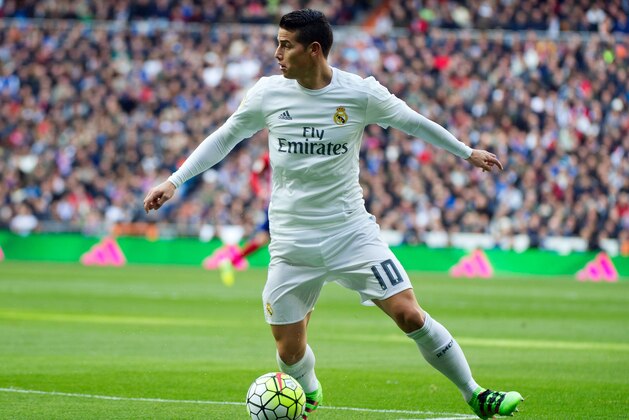 Real Madrid's Colombian midfielder James Rodriguez controls the ball during the Spanish league football match Real Madrid CF vs Club Atletico de Madrid at the Santiago Bernabeu stadium in Madrid on February 27, 2016. / AFP / CURTO DE LA TORRE        (Photo credit should read CURTO DE LA TORRE/AFP/Getty Images)