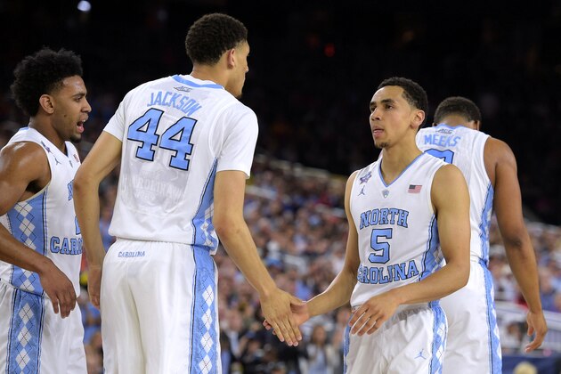 HOUSTON, TX - APRIL 02: Justin Jackson #44 and Marcus Paige #5 of the North Carolina Tar Heels react against the Syracuse Orange during the 2016 NCAA Men's Final Four Semifinal at NRG Stadium on April 02, 2016 in Houston, Texas. North Carolina won 83-66. (Photo by Lance King/Getty Images)