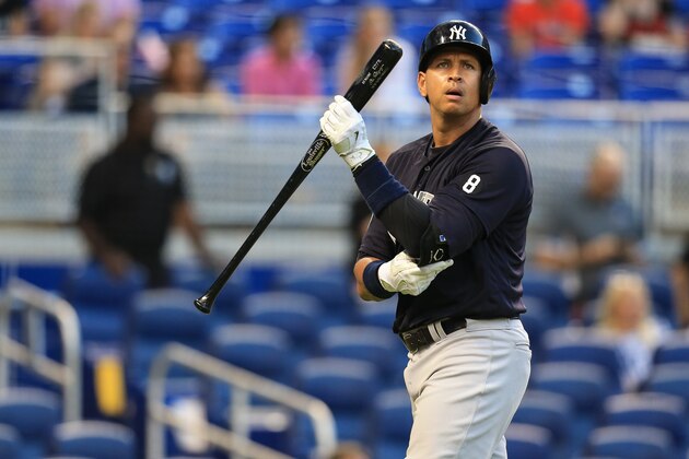 New York Yankees designated hitter Alex Rodriguez reacts after striking out during an exhibition baseball game against the Miami Marlins on Friday, April 1, 2016, in Miami. (AP Photo/Rob Foldy)
