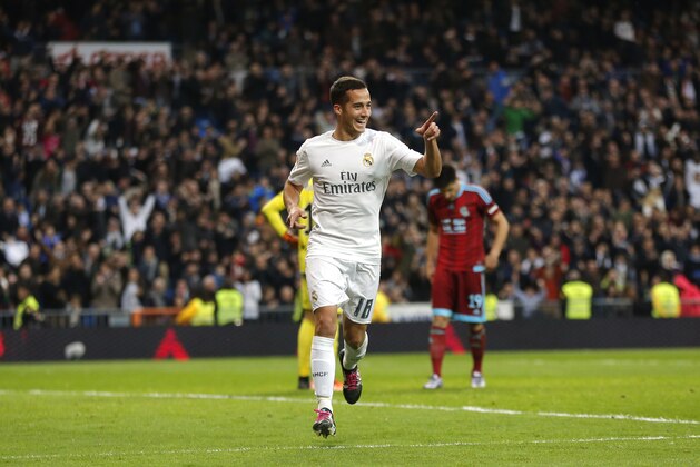 Real Madrid's Lucas Vazquez celebrates after scoring a goal during a Spanish La Liga soccer match between Real Madrid and Real Sociedad at the Santiago Bernabeu stadium in Madrid, Spain, Wednesday, Dec. 30, 2015. (AP Photo/Daniel Ochoa de Olza)