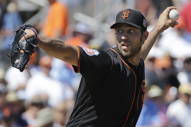 San Francisco Giants starting pitcher Madison Bumgarner against the Oakland Athletics during a spring training baseball game in Scottsdale, Ariz., Saturday, March 19, 2016. (AP Photo/Jeff Chiu)