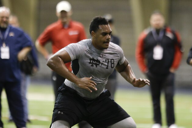 Notre Dame's Ronnie Stanley runs a drill during Notre Dame's NFL football Pro Day in South Bend, Ind., Thursday, March 31, 2016. (AP Photo/Michael Conroy)