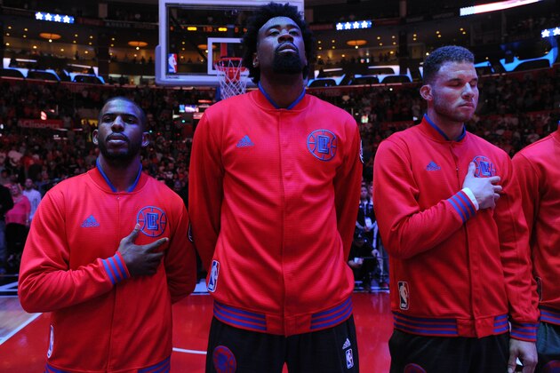 LOS ANGELES, CA - APRIL 3:  Chris Paul #3, DeAndre Jordan #6 and Blake Griffin #32 of the Los Angeles Clippers stand for the national anthem before the game against the Washington Wizards on April 3, 2016 at STAPLES Center in Los Angeles, California. NOTE TO USER: User expressly acknowledges and agrees that, by downloading and/or using this Photograph, user is consenting to the terms and conditions of the Getty Images License Agreement. Mandatory Copyright Notice: Copyright 2016 NBAE (Photo by Andrew D. Bernstein/NBAE via Getty Images)