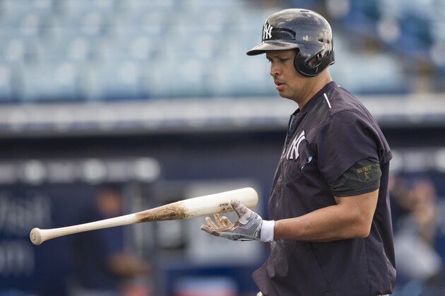 New York Yankees designated hitter Alex Rodriguez flips his bat after taking batting practice before a spring training baseball game with the Tampa Bay Rays Thursday, March 24, 2016, in Tampa, Fla. (AP Photo/Steve Nesius)