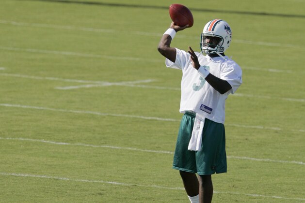 Rookie quarterback Marcus Vick passes the ball as he tries out for the Dolphins during a three-day mini-camp in Davie, Fla. Friday, May 5, 2006. Vick was not selected in the NFL draft last weekend after a troubled college career at Virginia Tech. (AP Photo/Lynne Sladky)