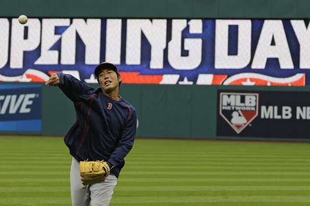 Boston Red Sox relief pitcher Koji Uehara warms up before a baseball game between the Red Sox and the Cleveland Indians, Monday, April 4, 2016, in Cleveland. (AP Photo/Tony Dejak)