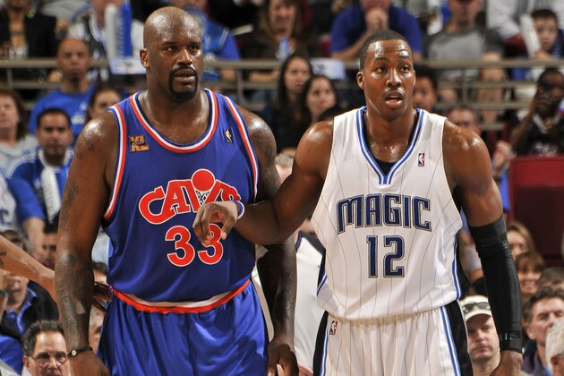 ORLANDO, FL - FEBRUARY 21:  Shaquille O'Neal #33 of the Cleveland Cavaliers and Dwight Howard #12 of the Orlando Magic during the game on February 21, 2010 at Amway Arena in Orlando, Florida. NOTE TO USER: User expressly acknowledges and agrees that, by downloading and or using this photograph, User is consenting to the terms and conditions of the Getty Images License Agreement. Mandatory Copyright Notice: Copyright 2010 NBAE  (Photo by Fernando Medina/NBAE via Getty Images)