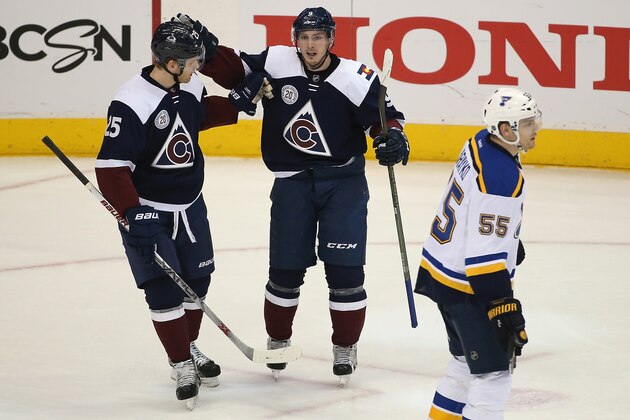 DENVER, CO - APRIL 03:  Matt Duchene #9 of the Colorado Avalanche celebrates his goal against the St. Louis Blues with Mikhail Grigorenko #25 of the Colorado Avalanche as Colton Parayko #55 of the St. Louis Blues skates to the bench at Pepsi Center on April 3, 2016 in Denver, Colorado. The Blues defeated the Avalanche 5-1. (Photo by Doug Pensinger/Getty Images)