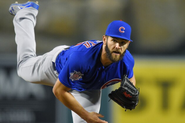Chicago Cubs starting pitcher Jake Arrieta throws to the plate during the second inning of an opening day baseball game against the Los Angeles Angels, Monday, April 4, 2016, in Anaheim, Calif. (AP Photo/Mark J. Terrill)