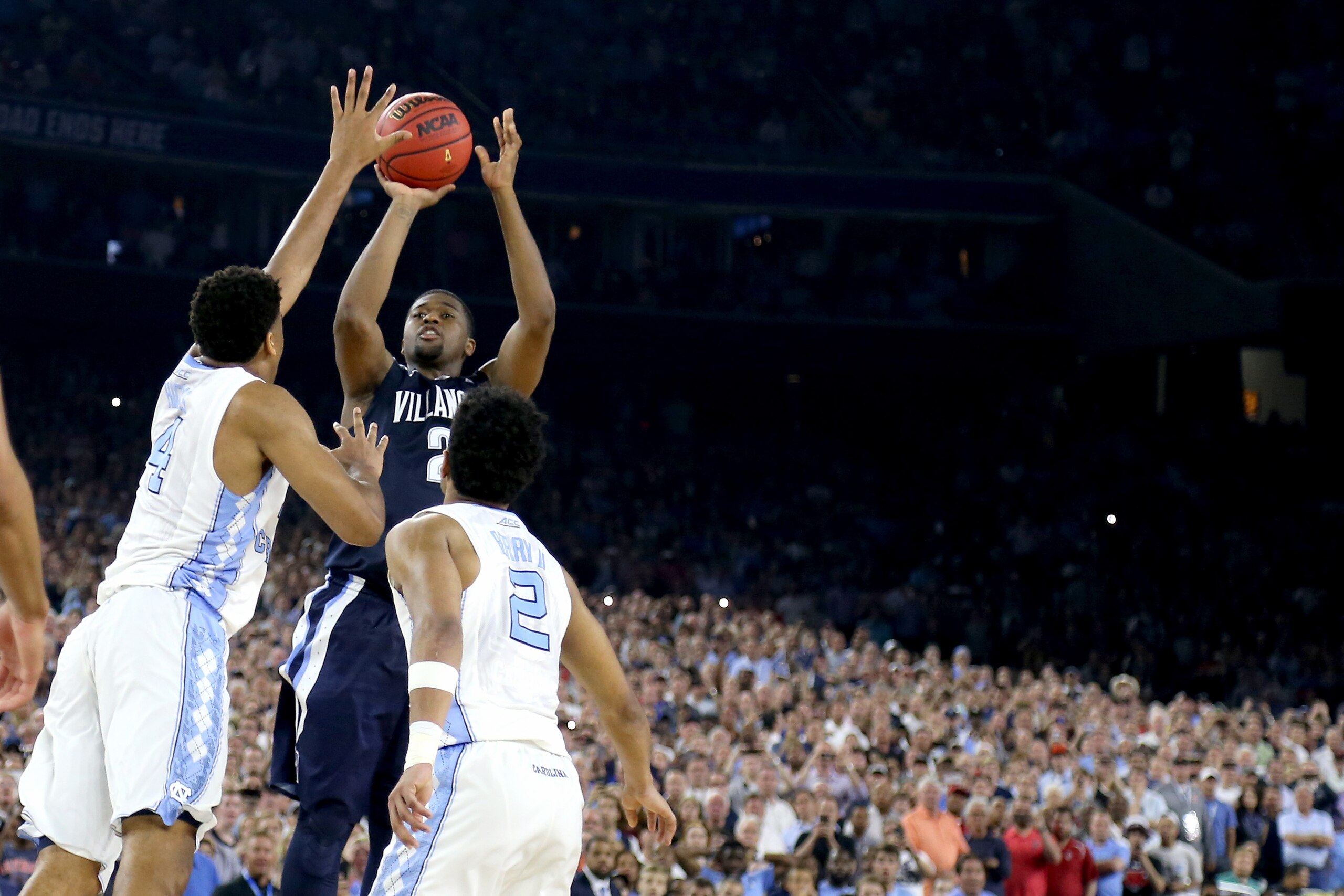 HOUSTON, TEXAS - APRIL 04:  Kris Jenkins #2 of the Villanova Wildcats shoots the game-winning three pointer to defeat the North Carolina Tar Heels 77-74 in the 2016 NCAA Men's Final Four National Championship game at NRG Stadium on April 4, 2016 in Houston, Texas.  (Photo by Streeter Lecka/Getty Images)