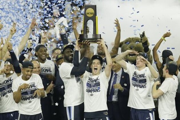 Villanova players celebrate after the NCAA Final Four tournament college basketball championship game against North Carolina, Monday, April 4, 2016, in Houston. Villanova won 77-74. (AP Photo/Charlie Neibergall)