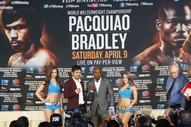Manny Pacquiao, center left, and Timothy Bradley Jr. pose during a news conference in Beverly Hills, Calif., on Tuesday, Jan. 19, 2016. Pacquiao and Bradley are scheduled to fight on April 9 in Las Vegas for Bradley's WBO welterweight title. (AP Photo/Nick Ut)