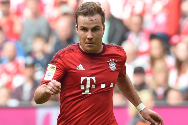 Bayern Munich's midfielder Mario Goetze plays the ball during the German Bundesliga first division football match between FC Bayern Munich and Eintracht Frankfurt in Munich, southern Germany, on April 2, 2016.
Bayern Munich won the match 1-0. / AFP / CHRISTOF STACHE / RESTRICTIONS: DURING MATCH TIME: DFL RULES TO LIMIT THE ONLINE USAGE TO 15 PICTURES PER MATCH AND FORBID IMAGE SEQUENCES TO SIMULATE VIDEO. == RESTRICTED TO EDITORIAL USE == FOR FURTHER QUERIES PLEASE CONTACT DFL DIRECTLY AT + 49 69 650050
        (Photo credit should read CHRISTOF STACHE/AFP/Getty Images)