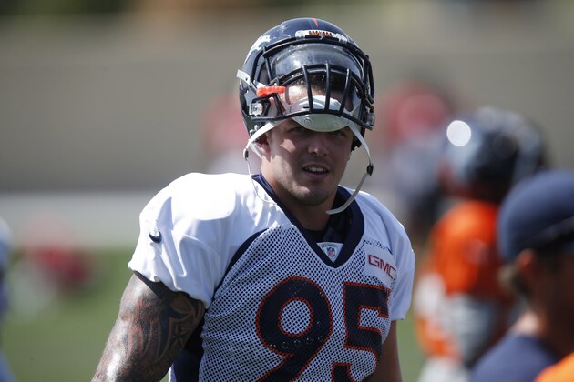 Denver Broncos defensive end Derek Wolfe (95) nduring an NFL football scrimmage at the Broncos' headquarters Wednesday, Aug. 26, 2015, in Englewood, Colo. (AP Photo/David Zalubowski)