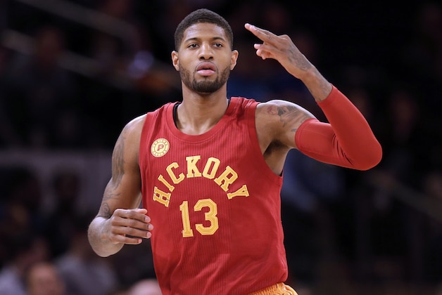 Indiana Pacers' Paul George reacts after making a three-point basket during the second half of the NBA basketball game against the New York Knicks, Sunday, April 3, 2016 in New York. The Pacers defeated the Knicks 92-87. (AP Photo/Seth Wenig)