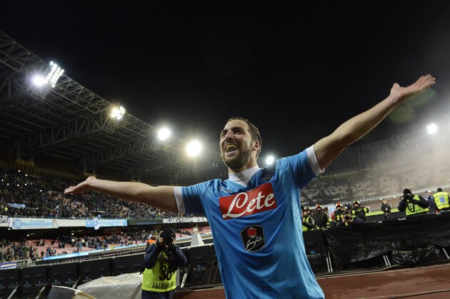 Napoli's Gonzalo Higuain celebrates after scoring his second goal during a Serie A soccer match between Napoli and Sassuolo, at the San Paolo stadium in Naples, Italy, Saturday, Jan. 16, 2016. (AP Photo/Salvatore Laporta)