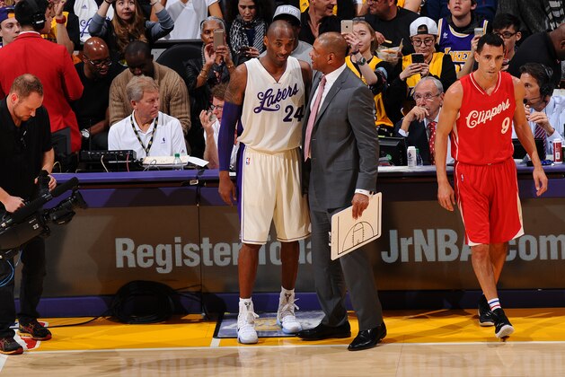 LOS ANGELES, CA - DECEMBER 25:  Kobe Bryant #24 of the Los Angeles Lakers talks with Doc Rivers of the Los Angeles Clippers after the game at Staples Center on December 25, 2015 in Los Angeles, California. NOTE TO USER: User expressly acknowledges and agrees that, by downloading and/or using this Photograph, user is consenting to the terms and conditions of the Getty Images License Agreement. Mandatory Copyright Notice: Copyright 2015 NBAE (Photo by Juan Ocampo/NBAE via Getty Images)