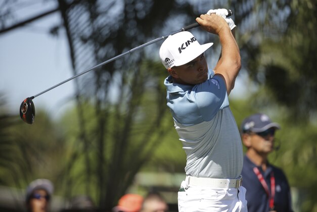 Rickie Fowler tees off on the third hole during the third round of the Honda Classic golf tournament, Saturday, Feb. 27, 2016, in Palm Beach Gardens, Fla. (AP Photo/Lynne Sladky)