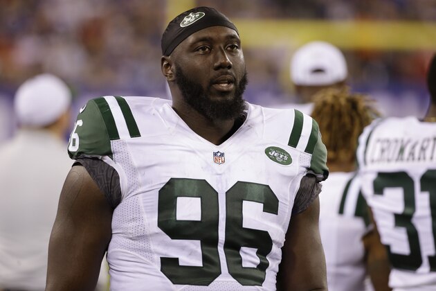 FILE - In this Saturday, Aug. 29, 2015 file photo, New York Jets defensive end Muhammad Wilkerson (96) walks the sidelines during the second half of a preseason NFL football game against the New York Giants in East Rutherford, N.J. Muhammad Wilkerson was 10 when his mother had breast cancer. Wilkerson honored 96 _ the number of his jersey _ breast cancer survivors at a three-course luncheon Tuesday, Oct. 13, 2015 at Central Park restaurant not far from where he grew up. October is the NFL's Breast Cancer Awareness month. (AP Photo/Seth Wenig)
