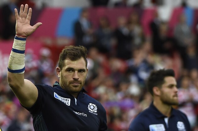 Scotland's wing Sean Lamont waves at the end of the Pool B match of the 2015 Rugby World Cup between Scotland and Japan at Kingsholm stadium in Gloucester, west England on September 23, 2015.  AFP PHOTO / LOIC VENANCE  RESTRICTED TO EDITORIAL USE, NO USE IN LIVE MATCH TRACKING SERVICES, TO BE USED AS NON-SEQUENTIAL STILLS        (Photo credit should read LOIC VENANCE/AFP/Getty Images)
