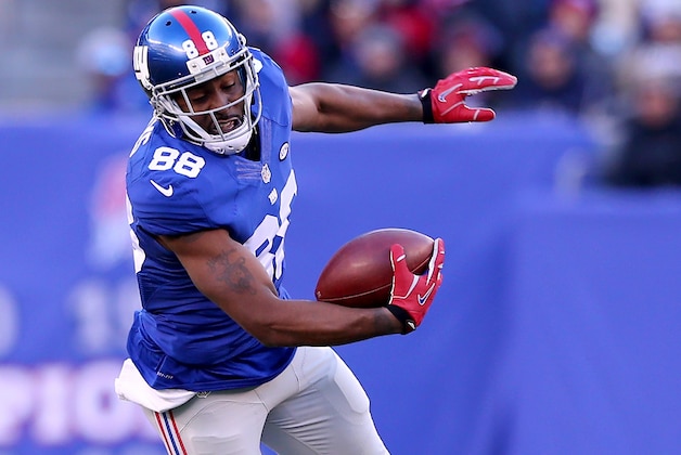 EAST RUTHERFORD, NJ - JANUARY 03:   Hakeem Nicks #88 of the New York Giants is tackled by  Chris Maragos #42 of the Philadelphia Eagles at MetLife Stadium on January 3, 2016 in East Rutherford, New Jersey.The Philadelphia Eagles defeated the New York Giants 35-30.  (Photo by Elsa/Getty Images)