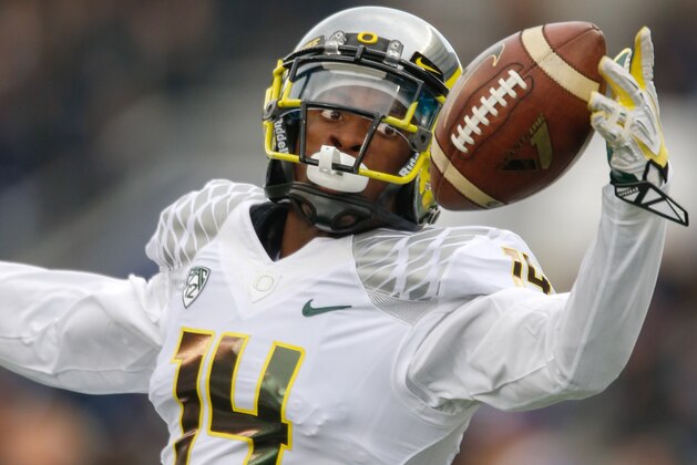 SEATTLE, WA - OCTOBER 12:  Cornerback Ifo Ekpre-Olomu #14 of the Oregon Ducks warms up prior to the game against the Washington Huskies on October 12, 2013 at Husky Stadium in Seattle, Washington.  (Photo by Otto Greule Jr/Getty Images)