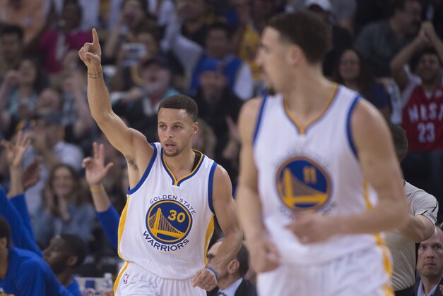 April 3, 2016; Oakland, CA, USA; Golden State Warriors guard Stephen Curry (30) celebrates after making a basket during the first quarter against the Portland Trail Blazers at Oracle Arena. Mandatory Credit: Kyle Terada-USA TODAY Sports