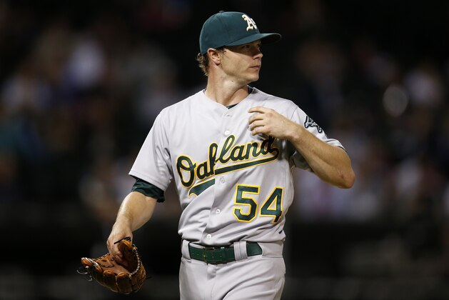 Oakland Athletics starting pitcher Sonny Gray heads to the dugout after being relieved during the fourth inning of a baseball game against the Chicago White Sox, Monday, Sept. 14, 2015, in Chicago. (AP Photo/Andrew A. Nelles)